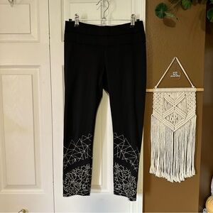 Athleta Black Cropped Leggings with Gold Detailing / Size S
